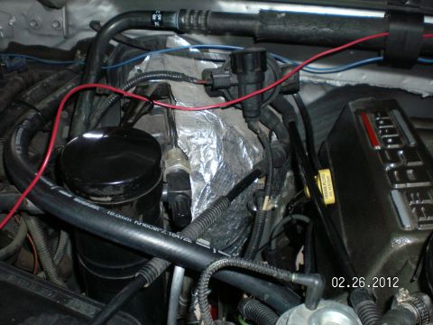 1996 Ford Bronco - Here I ran the plastic hose "under" the heater hose and you can see where it runs to............