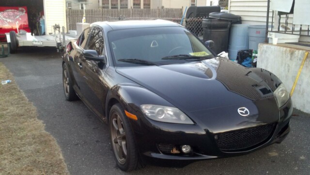 Black Mazda RX-8 front 3/4 view