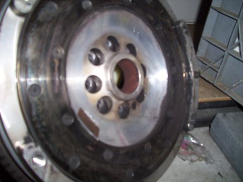 2003 Hyundai Tiburon - This image shows a close-up view of a vehicle's flywheel, a critical component of the powertrain system.