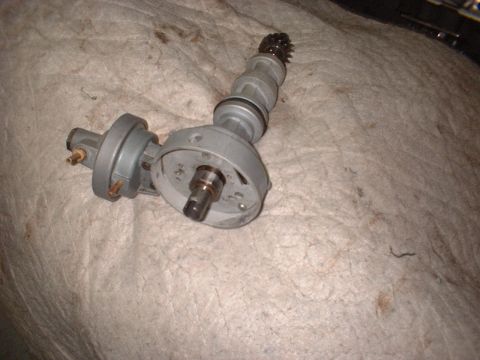 1969 Mercury Cyclone - Close-up of an automotive distributor part, likely for an older engine.