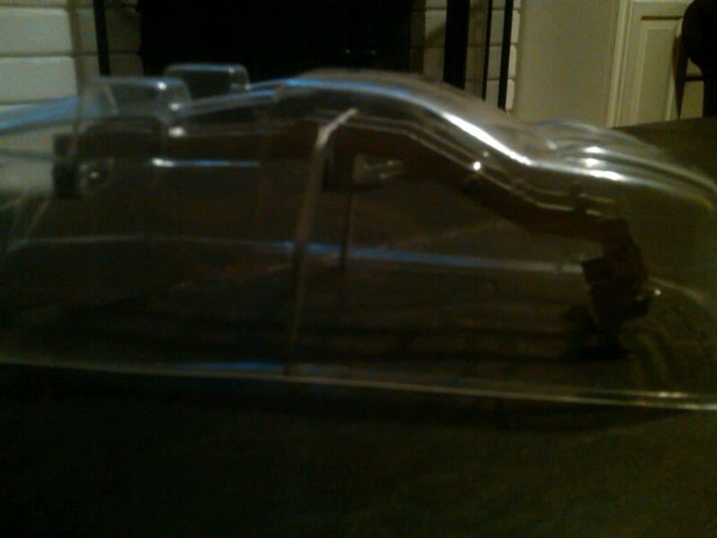 Clear plastic RC car body shell, side view