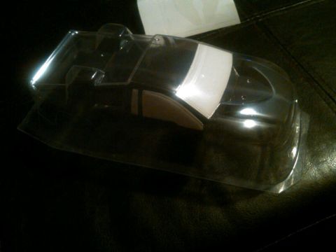 1986 Ford Bronco - Unpainted clear plastic body shell for a remote control car, ready for customization.