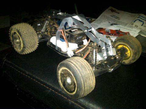 1986 Ford Bronco - This is a close-up view of a remote control car's internal components and chassis structure.
