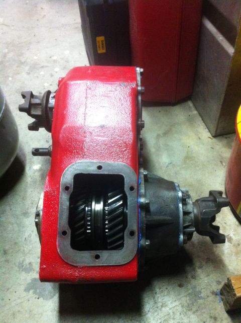 1989 Ford Bronco - Transfer case with visible gears and yokes, likely for a 4x4 vehicle.