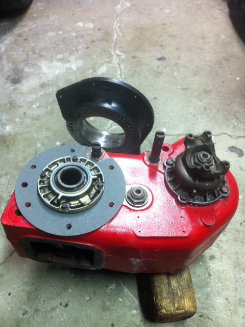 1989 Ford Bronco - Transfer case assembly with adapter plate, likely for an older 4x4 vehicle.