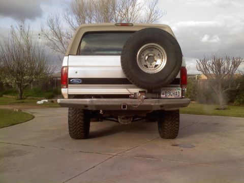 1996 Ford Bronco - This Ford Bronco's rear end is visible, showing its spare tire and license plate.