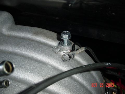 1989 Ford Bronco - Remove the ground straps from the rear of the manifold