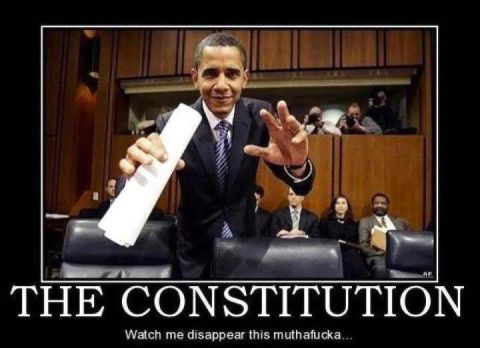 2000 Mercury Grand Marquis - Barack Obama holds up a document in what appears to be a hearing room.