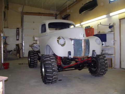 1978 Ford F-150 - Custom pickup truck build in progress, oversized tires and a modified suspension system.