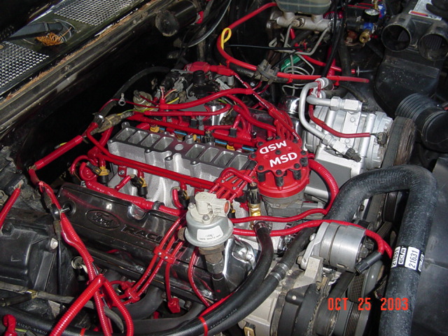 Then unbolt and remove the upper intake manifold