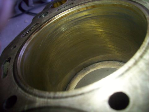 2003 Hyundai Tiburon - Close-up view of an engine cylinder, showing wear patterns and internal surface.