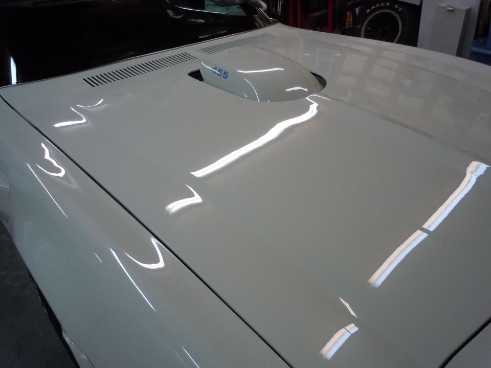 white 1973 Pontiac Trans Am hood with shaker scoop that says 455