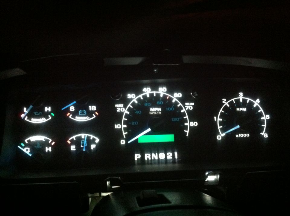 LED lights installed in cluster. I think it looks great. Heater controls cant really be done. I tried and messed up my panel and now have to replace it. Ill get a picture of the LED I used up soon. All of the dash trim is off in this picture by the way...