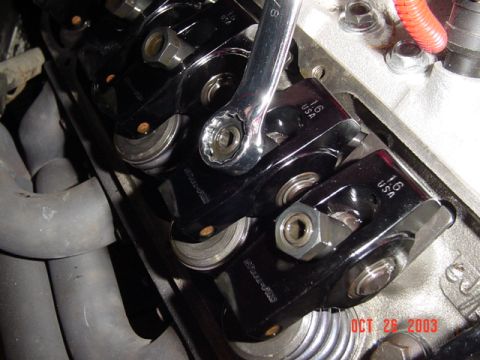 1989 Ford Bronco - Line up the rotor to the cylinder you want to work on.. then loosen the nut holding the rocker