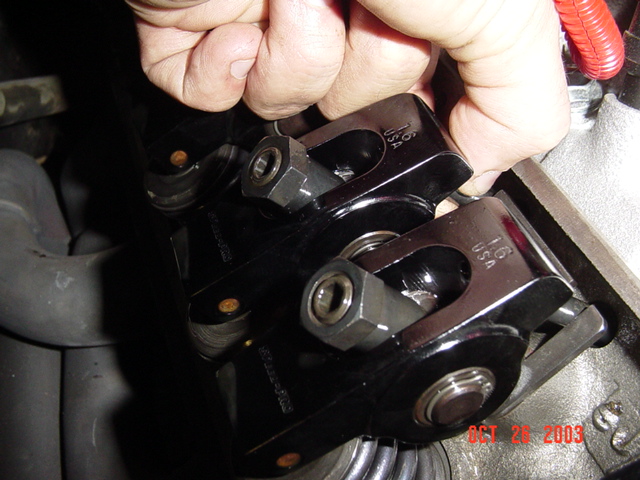 Check the pushrod, make sure the rocker is touching it