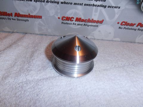 1990 Ford Bronco - A billet aluminum pulley is shown with text on the box indicating it is CNC machined.