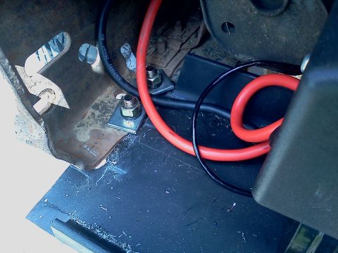 1989 Ford Bronco - Wiring for a winch mount is visible, secured with nuts and bolts.