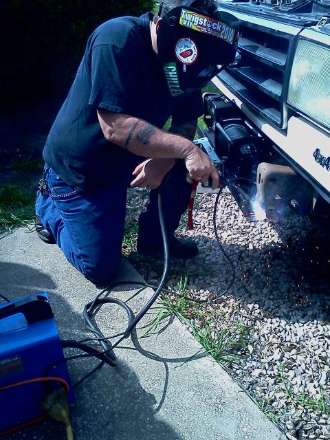 1989 Ford Bronco - Welding a winch mount onto the front bumper of a 1989 Ford Bronco.