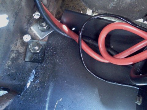 1989 Ford Bronco - Battery cables and mounting hardware shown in detail.