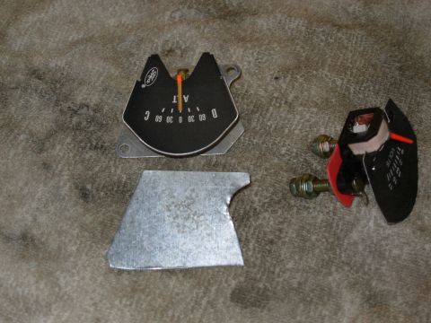 1975 Ford Bronco - A few minutes with some tin snips turned a piece of scrap metal into a new backplate.