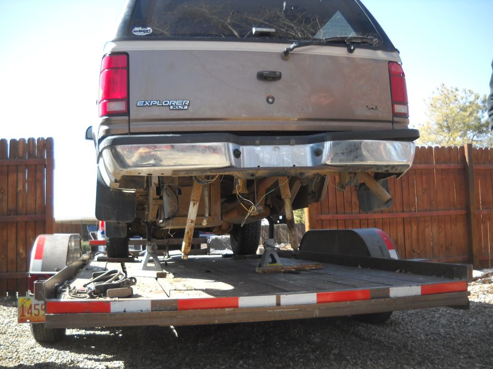 1992 Ford Explorer rear on trailer with jack stands
