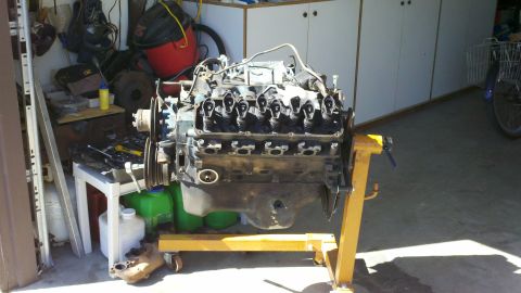 1978 Ford Bronco - Engine removed from vehicle and placed on a stand for rebuilding or repair.