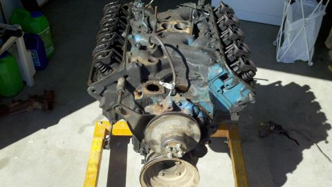1978 Ford Bronco - A V8 engine is shown on an engine stand, likely before or after a rebuild.