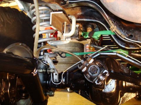1995 Ford Bronco - Rear axle and suspension components, possibly during a repair or upgrade.
