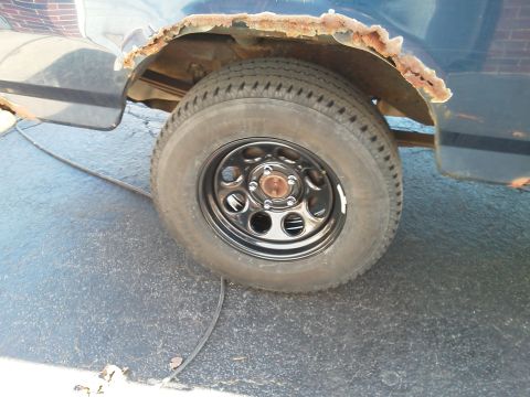 1995 Ford Bronco - ...in with the new. This is the rear passenger tire, the same one that was all mangled earlier.