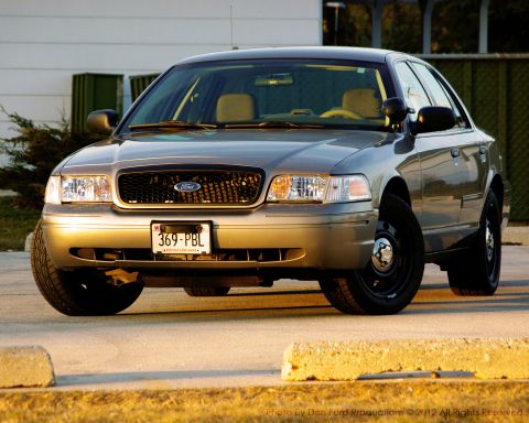 2005 Ford Crown Victoria - This Ford Crown Victoria is shown from the front, its grille and license plate.