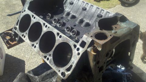 1978 Ford Bronco - This engine block is shown from the side, revealing its cylinder bores and other internal components.