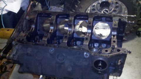 1978 Ford Bronco - Engine block disassembled for rebuild, with visible cylinder bores and Supermotors branding.