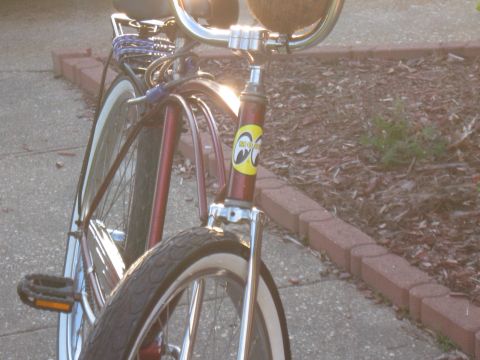 1994 Ford Bronco - Front view of a bicycle with chrome handlebars and a Moon Eyes decal on the fork.