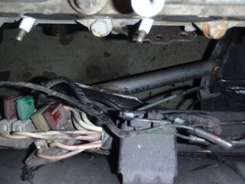 1978 Nissan 300ZX - A close-up view of engine components, including spark plugs and wiring harnesses.