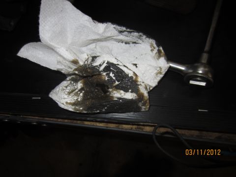 1979 Ford Bronco - Dirty paper towel and a ratchet wrench are visible in the photo, dated 03/11/2012.