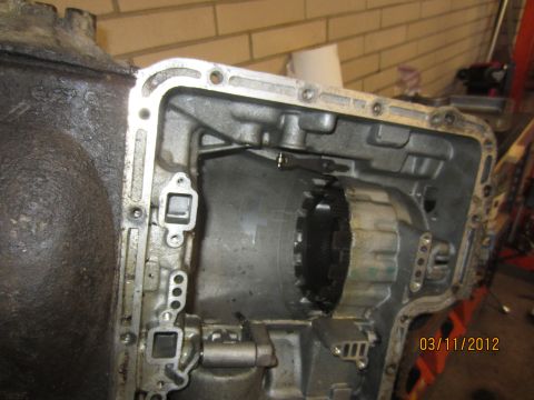 1979 Ford Bronco - Close-up of an open transmission showing internal components and gears.