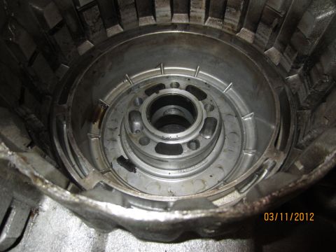 1979 Ford Bronco - Interior view of a transmission torque converter housing, showing internal components and mounting points.