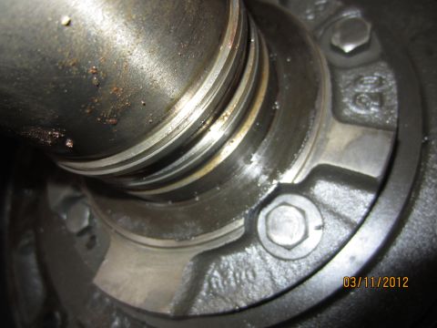 1979 Ford Bronco - A close-up view of a mechanical part, possibly from a transmission, with a date stamp visible.