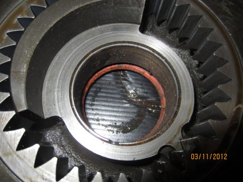 1979 Ford Bronco - Internal view of gears and a red seal, with a date stamp of 03/11/2012.