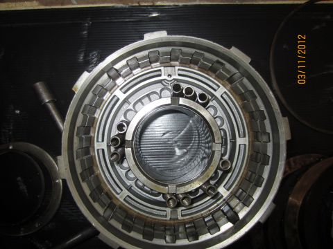 1979 Ford Bronco - This automatic transmission clutch pack shows signs of wear and tear, indicating a need for rebuild or replacement.
