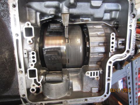 1979 Ford Bronco - The internal components of an automatic transmission are visible, including clutch packs and a torque converter.