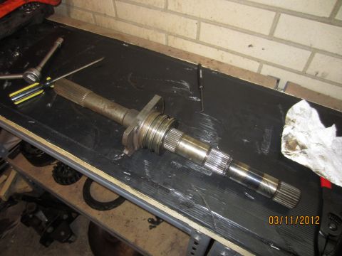 1979 Ford Bronco - Transmission input shaft on a workbench, likely for a rebuild or repair.