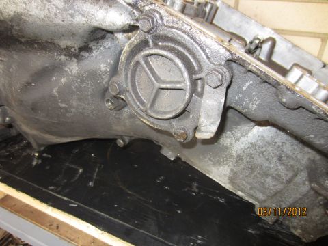 1979 Ford Bronco - A close-up view of a transmission component, showing mechanical details and some wear.