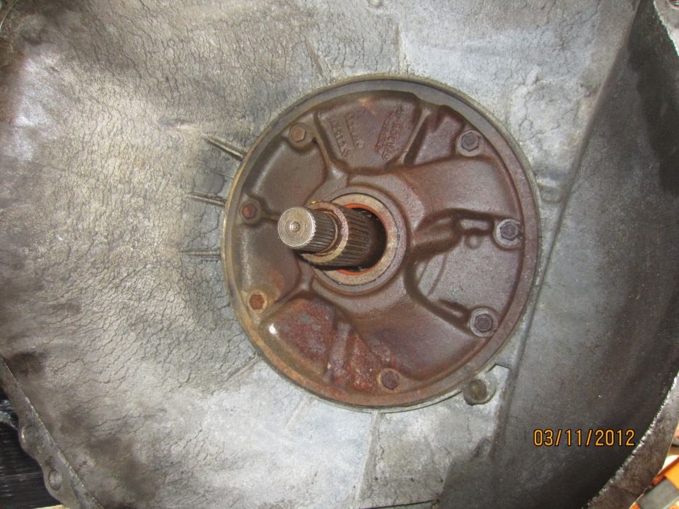 Close-up of a transmission oil pump with splined shaft. Date stamp 03/11/2012