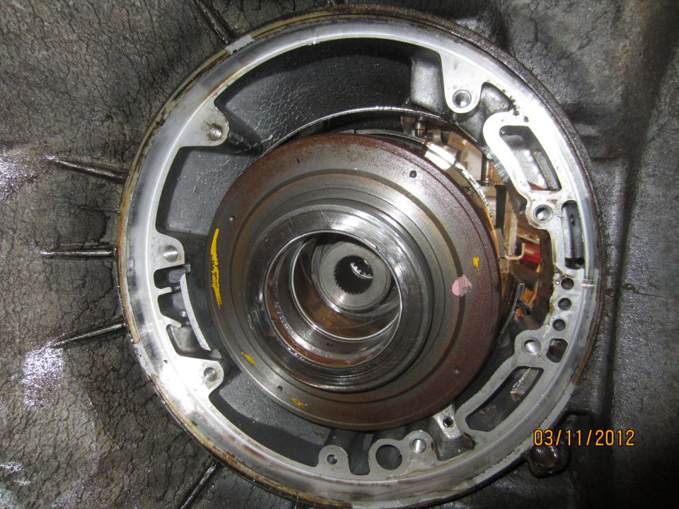 Transmission torque converter with visible rust and internal components