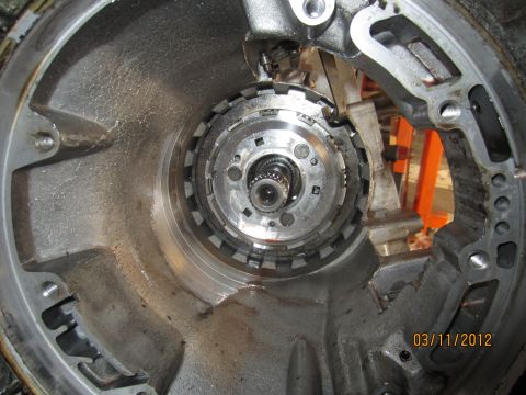 1979 Ford Bronco - Close-up view of the interior of a transmission torque converter housing, showing the splined shaft.