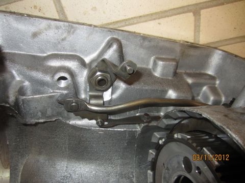 1979 Ford Bronco - Internal view of transmission components, showing linkage and gear teeth.