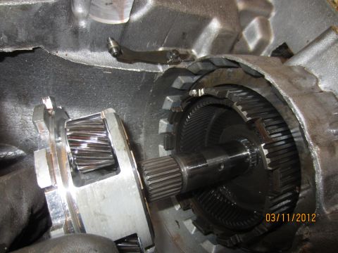 1979 Ford Bronco - Close-up view of internal transmission components, including gears and a clutch pack, with a date stamp of 03/11/2012.