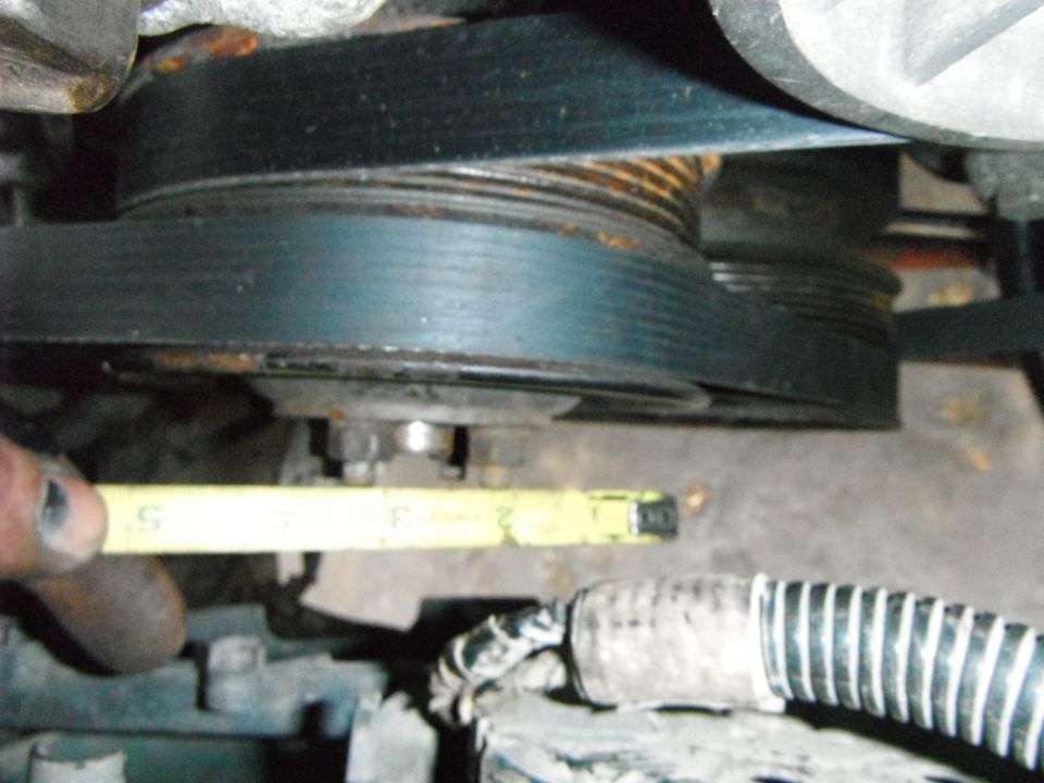 Engine pulleys and belt with a tape measure