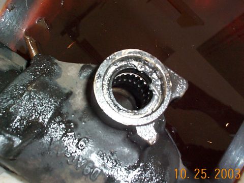 1992 Ford Bronco - Snap ring over the trashed seal. It helps to have a good set of ring pliers.